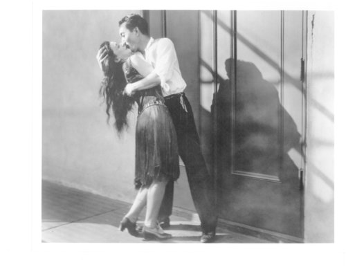 Two actors kissing